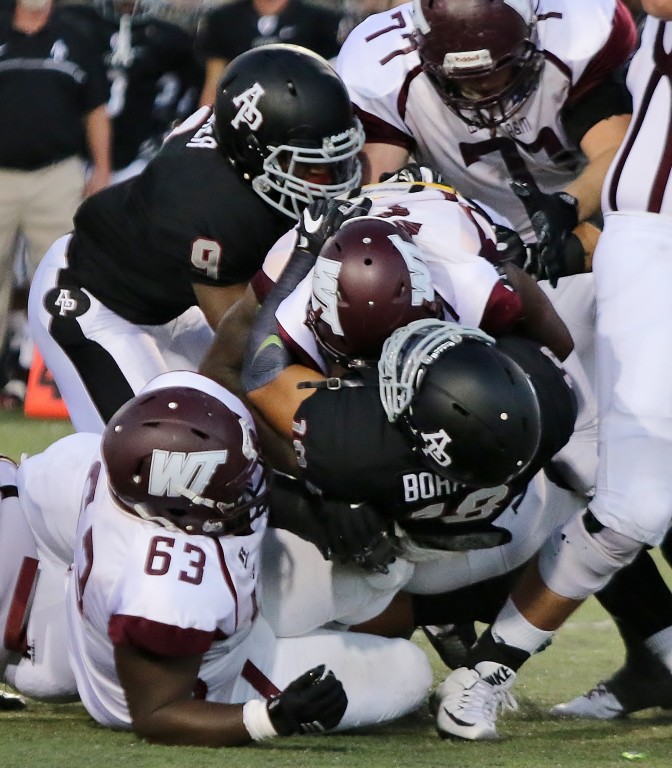 Big night for the Cougar defense holding West Texas A&M to ten points. (Photo by Duane Barker)