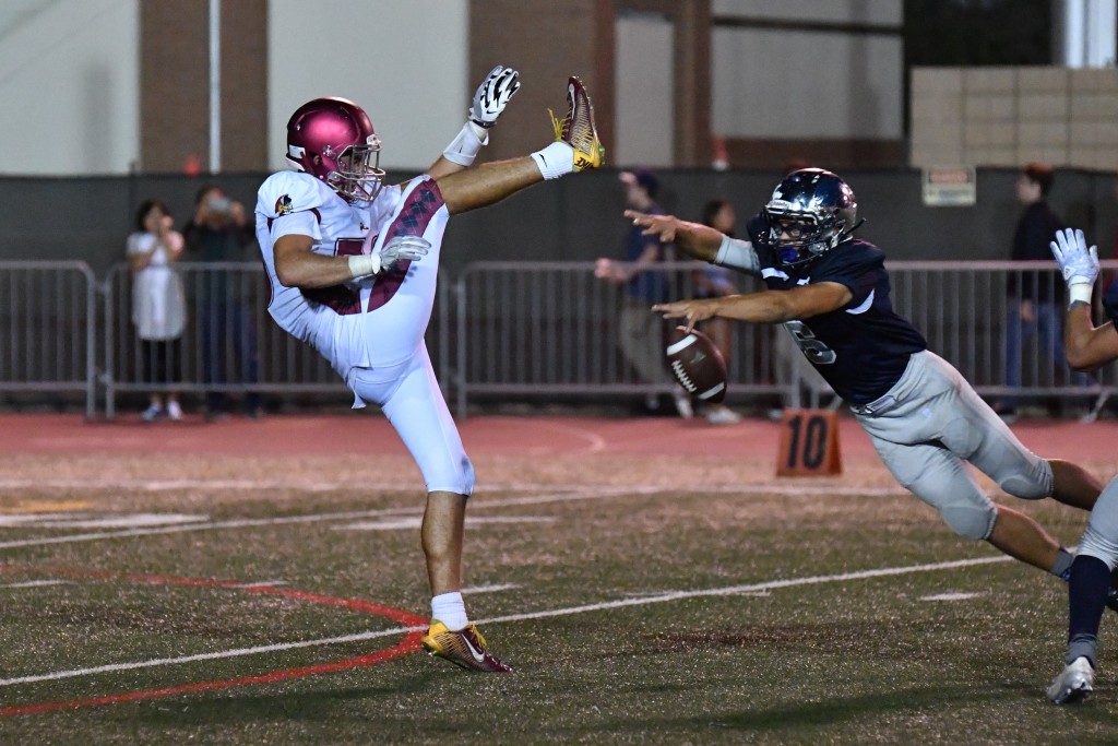 CV's Chuck Weinmann lays out to block a punt against La Canada. (Photo by Downtown Doug Brown)