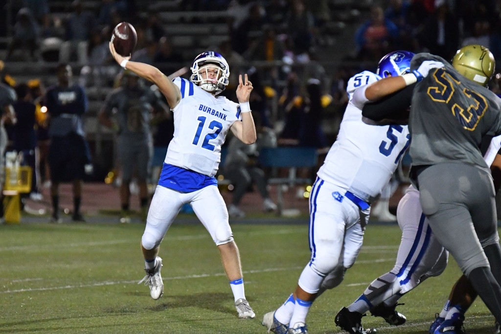 Guy Gibbs & Burbank evened they record at 2-2 and are now 1-0 in the Pacific with a 39-14 victory over Muir on Friday night. (Photo by Doug Brown)