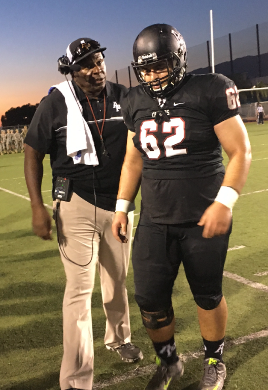 San Dimas alum, Youssef Hanna receiving instruction from NFL Hall of Famer, Jackie Slater at APU. (Photo courtesy of Mark Holman)