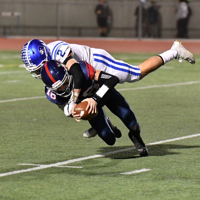 Forest Fajardo's blindside of Luke Wilson, according to the Yorba Linda boosters, was the hardest hit Wilson took all year. (Photo by Downtown Doug Brown)