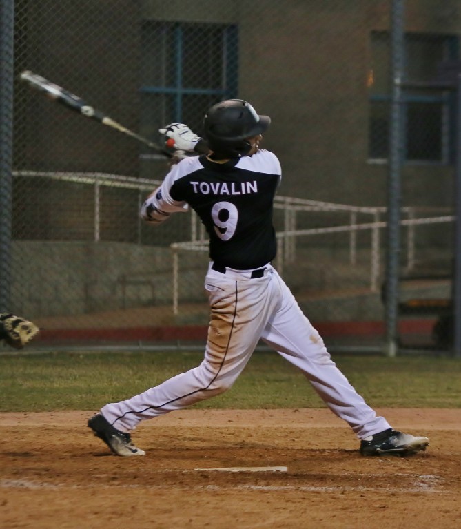 Adrian Tovalin belted three home runs and drove in line to lead the Cougar rout. (Photo by Duane Barker) 