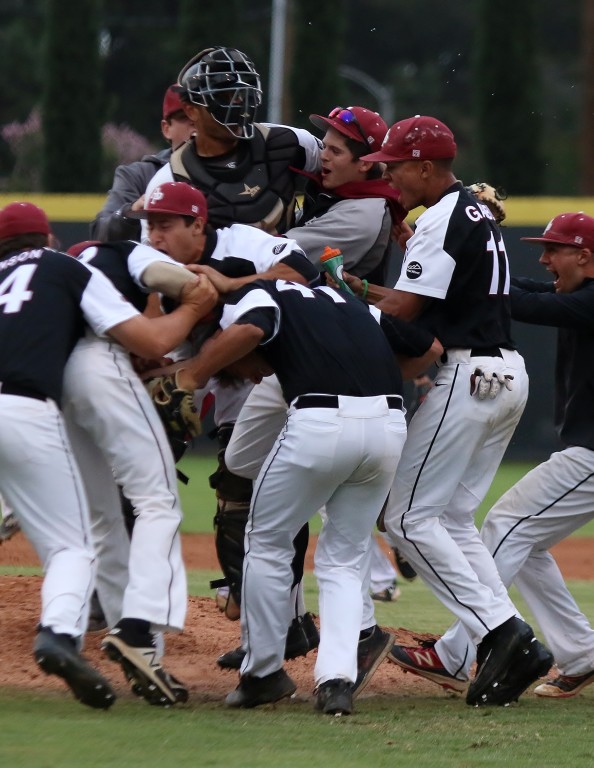 The Cougars celebrate the title (Photo by Duane Barker) 